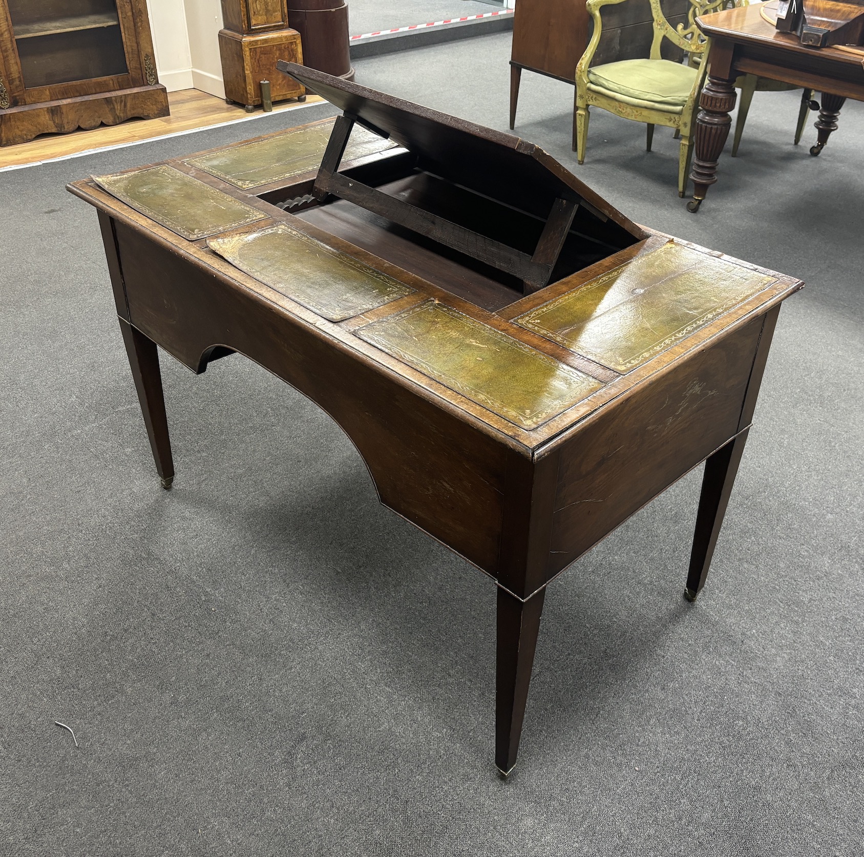 An early 19th century mahogany kneehole desk, width 117cm, depth 69cm, height 75cm